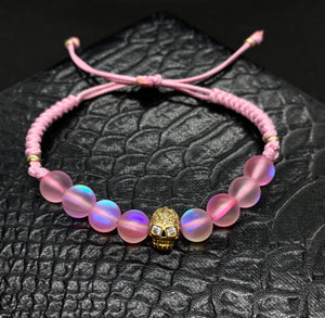 PULSERA CUARZO ELECTRIFICADO ROSA CON CALAVERA CHAPA ORO 24K